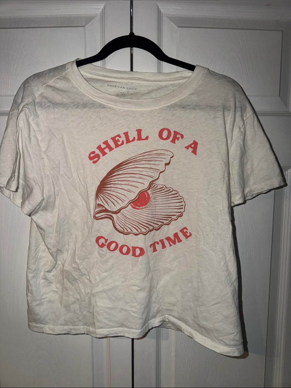 American Eagle Outfitters Cream Short Sleeve Tee with Red Graphic